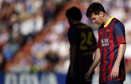 Barcelona's Lionel Messi reacts during his team's Spanish first division soccer match against Valladolid at Jose Zorilla stadium in Valladolid March 8, 2014. REUTERS/Sergio Perez