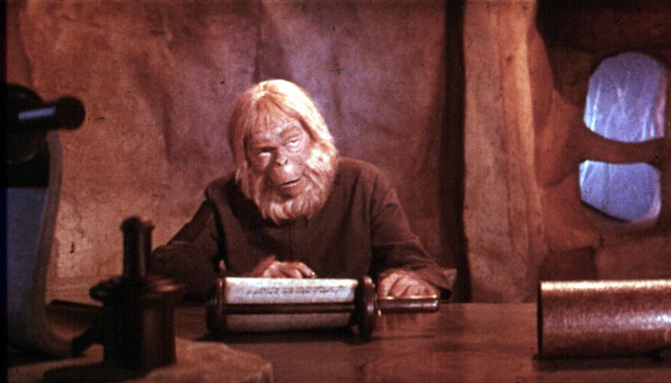 closeup of Doctor Zaius at a desk