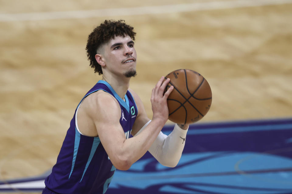 Charlotte Hornets guard LaMelo Ball shoots against the Orlando Magic during the first half of an NBA basketball game in Charlotte, N.C., Friday, May 7, 2021. (AP Photo/Nell Redmond)