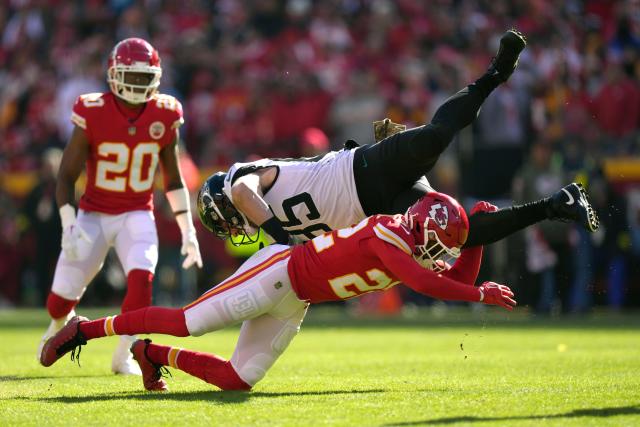 Kansas City Chiefs safety Juan Thornhill (22) tackles Cincinnati