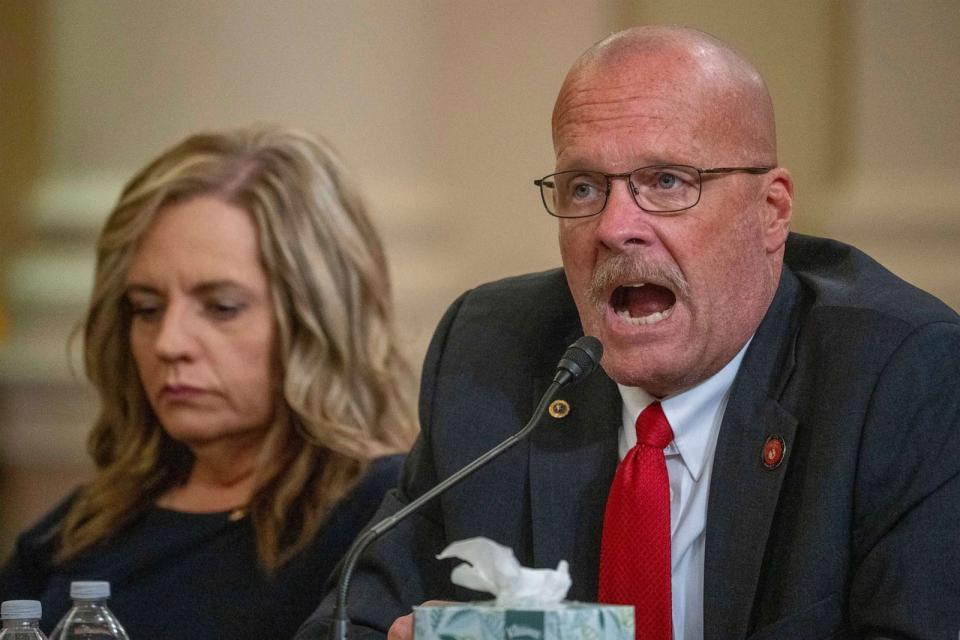 PHOTO: Darin Hoover, right, and Kelly Barnett parents of Marine Corps Staff Sgt. Taylor Hoover, Abbey Gate Gold Star family members, speaks at a House Foreign Affairs Committee roundtable, on Capitol Hill, Aug. 29, 2023 in Washington. (Alex Brandon/AP)