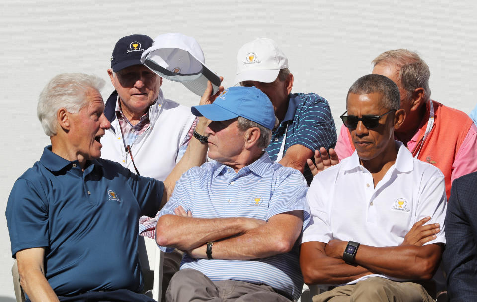 <p>(L-R) Former U.S. Presidents Bill Clinton, George W. Bush and Barack Obama attend the trophy presentation prior to Thursday foursome matches of the Presidents Cup at Liberty National Golf Club on September 28, 2017 in Jersey City, New Jersey. (Photo by Sam Greenwood/Getty Images) </p>