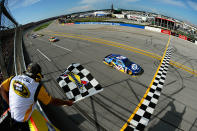 TALLADEGA, AL - MAY 06: Brad Keselowski, driver of the #2 Miller Lite Dodge, races to the checkered flag to win the NASCAR Sprint Cup Series Aaron's 499 at Talladega Superspeedway on May 6, 2012 in Talladega, Alabama. (Photo by Jared C. Tilton/Getty Images)