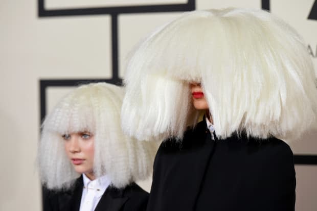 The look that started it all: Maddie Ziegler (L) and Sia (R) in custom Giorgio Armani at the 2015 Grammy Awards. 