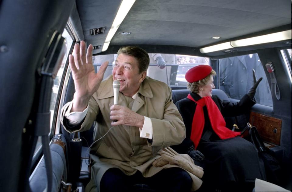 <div class="inline-image__caption"><p>President Reagan and Nancy Reagan in the limousine waving to the crowd in Dixon Illinois, Feb. 6, 1984.</p></div> <div class="inline-image__credit">Pete Souza / The White House</div>