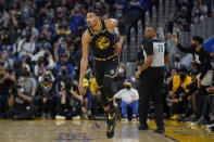 Golden State Warriors forward Otto Porter Jr. (32) celebrates after shooting a 3-point basket during the second half of an NBA basketball game against the Utah Jazz in San Francisco, Sunday, Jan. 23, 2022. (AP Photo/Jeff Chiu)