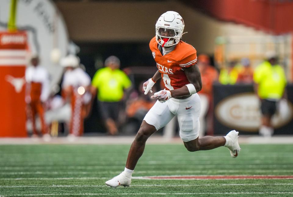 Texas defensive back Andrew Mukuba, seen in coverage during Saturday's 56-7 win over UTSA, has helped solidify the secondary since transferring over from Clemson. The LBJ product leads the Horns against Louisiana-Monroe on Saturday.