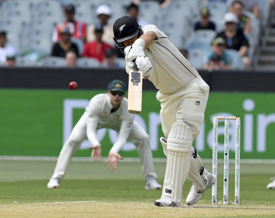 New Zealand's Ross Taylor edges the ball to slips to be dismissed by Australia during their cricket test match in Melbourne, Australia, Saturday, Dec. 28, 2019. (AP Photo/Andy Brownbill)