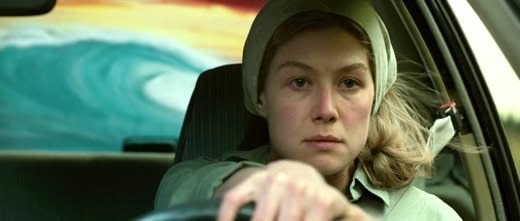 Amy driving a car in Gone Girl.