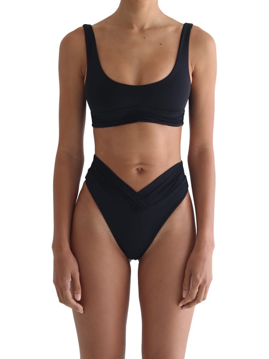 Get <a href="https://www.riotswim.com/products/pico-top-black" target="_blank" rel="noopener noreferrer">the Riot Swim Pico top﻿</a> and <a href="https://www.riotswim.com/products/pico-high-waist-bottom-black" target="_blank" rel="noopener noreferrer">high-waist bottom</a> for $75 each