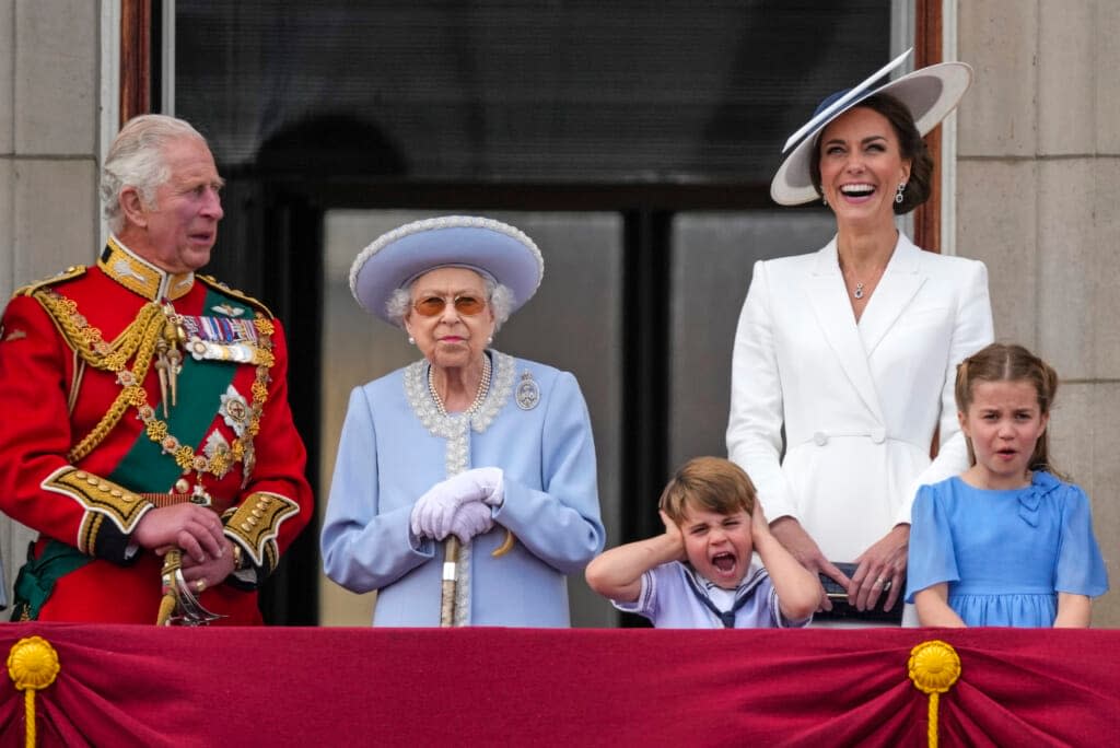 Britain’s Prince Charles, Queen Elizabeth II, Prince Louis, Kate, Duchess of Cambridge, Princess Charlotte, from left, stand on the balcony of Buckingham Palace, London, Thursday June 2, 2022, on the first of four days of celebrations to mark the Platinum Jubilee. Queen Elizabeth II, Britain’s longest-reigning monarch and a rock of stability across much of a turbulent century, has died. She was 96. Buckingham Palace made the announcement in a statement on Thursday Sept. 8, 2022. (AP Photo/Alastair Grant, File)