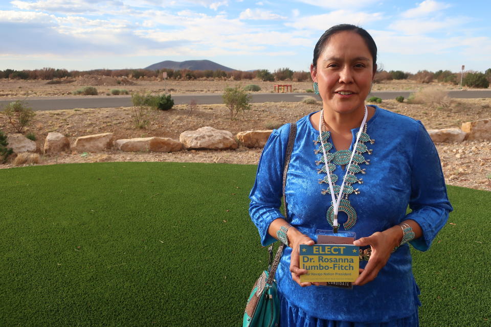 Rosanna Jumbo-Fitch poses for a photograph before a Navajo Nation presidential forum at a tribal casino outside Flagstaff Arizona, on Tuesday, June 21, 2022. Jumbo-Fitch is among 15 candidates seeking the top leadership post on the largest Native American reservation in the U.S. (AP Photo/Felicia Fonseca)