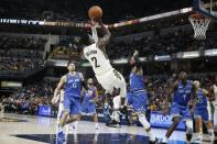 Mar 30, 2019; Indianapolis, IN, USA; Indiana Pacers guard Darren Collison (2) makes a shot against Orlando Magic guard D.J. Augustin (14) during the third quarter at Bankers Life Fieldhouse. Mandatory Credit: Brian Spurlock-USA TODAY Sports