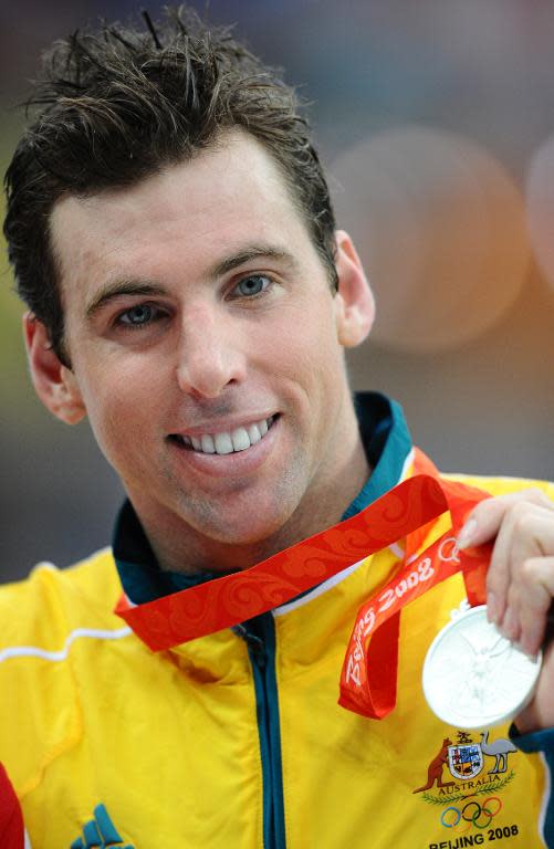 Australia's Grant Hackett poses after the men's 1500m freestyle swimming final medal ceremony during the Beijing Olympics on August 17, 2008