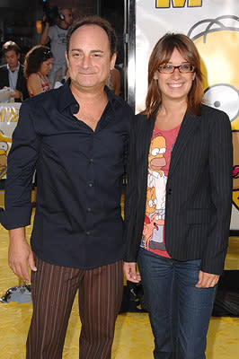 Kevin Pollack and guest  at the Los Angeles premiere of 20th Century Fox's The Simpsons Movie