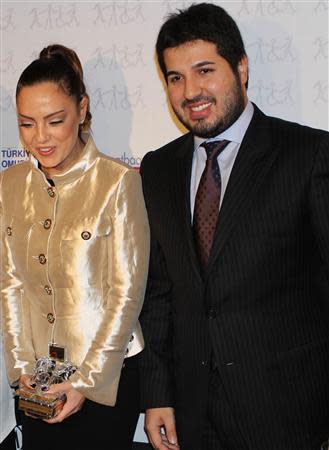 Turkish singer Ebru Gundes is seen with her husband, businessman Reza Zarrab (R), in Istanbul in this February 27, 2013 file photo. REUTERS/Hurriyet Daily/Handout