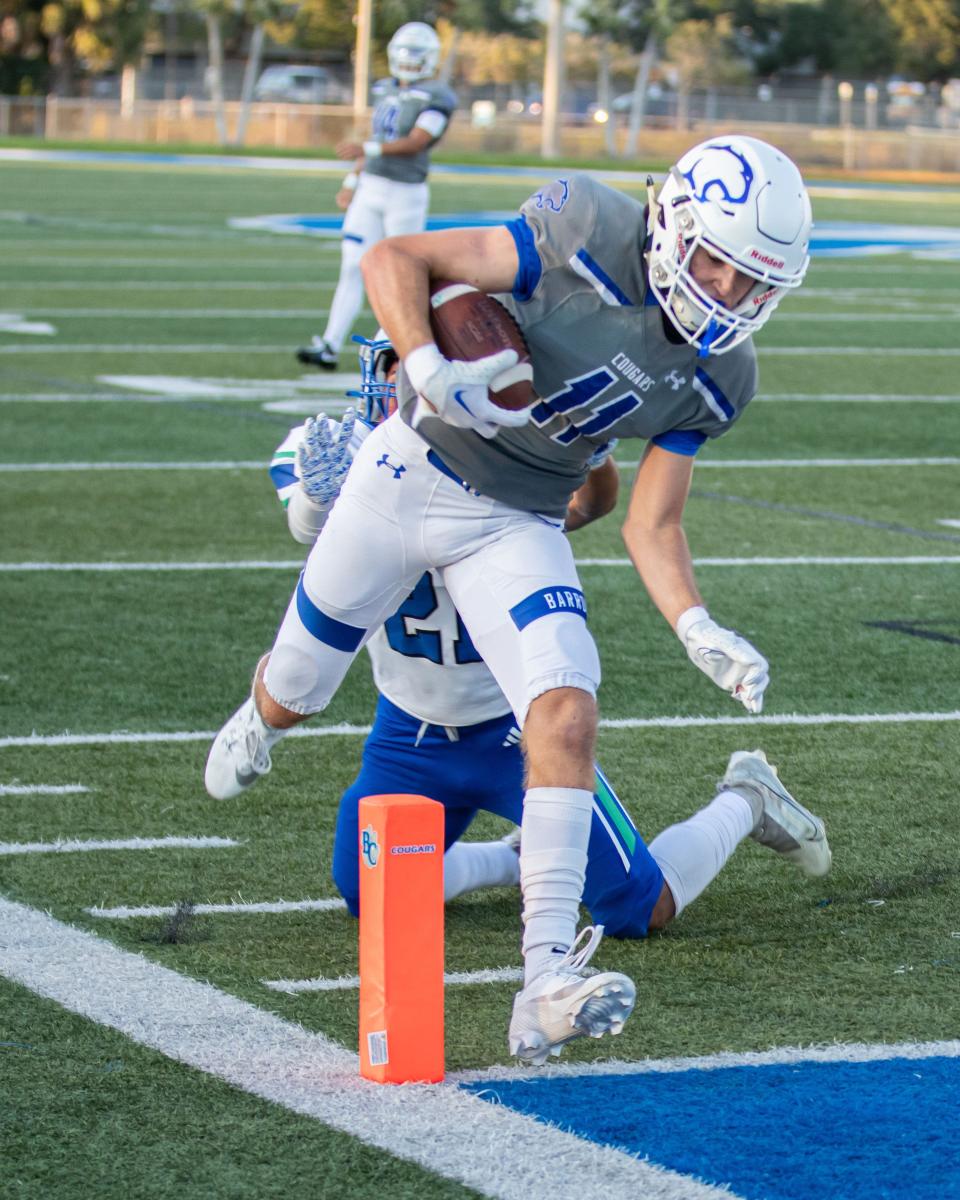 Barron Collier hosted Bonita Springs on Thursday, Sept. 14, 2023. The Cougars won 49-0. Barron Collier's Caden Hudson scores.