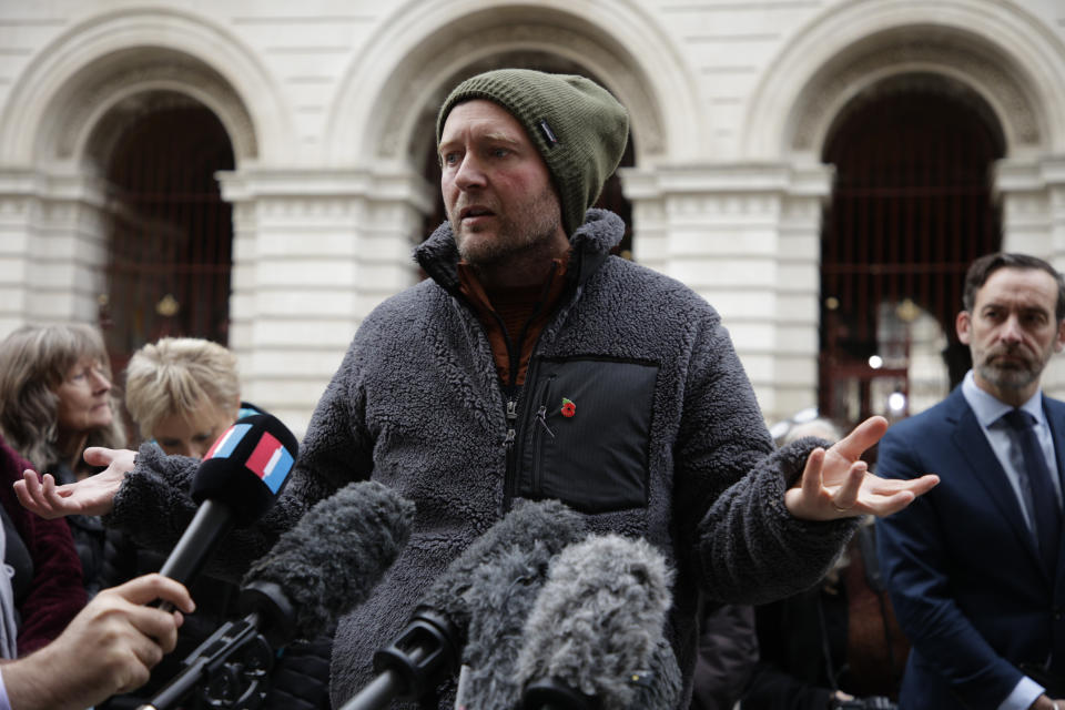 Richard Ratcliffe, husband of detained charity worker Nazanin Zaghari-Ratcliffe, talks to the media following a meeting at the Foreign, Commonwealth and Development Office in London, Thursday, Nov. 11, 2021. Ratcliffe began a hunger strike 19 days ago after a court decided his wife has to spend another year in an Iranian prison, where she has been detained since 2016. (AP Photo/David Cliff)