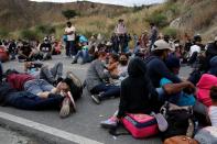 Hondurans take part in a new caravan of migrants set to head to the United States