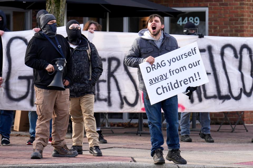 A protester shouts across the street at counterprotesters on High Street outside of Our Lady of Peace Catholic Church on Saturday morning. Proud Boys were also present, protesting Holi-drag, an event at the Red Oak Community School, where local drag queens read story books. The event was cancelled due to a safety concerns, the school said on social media.