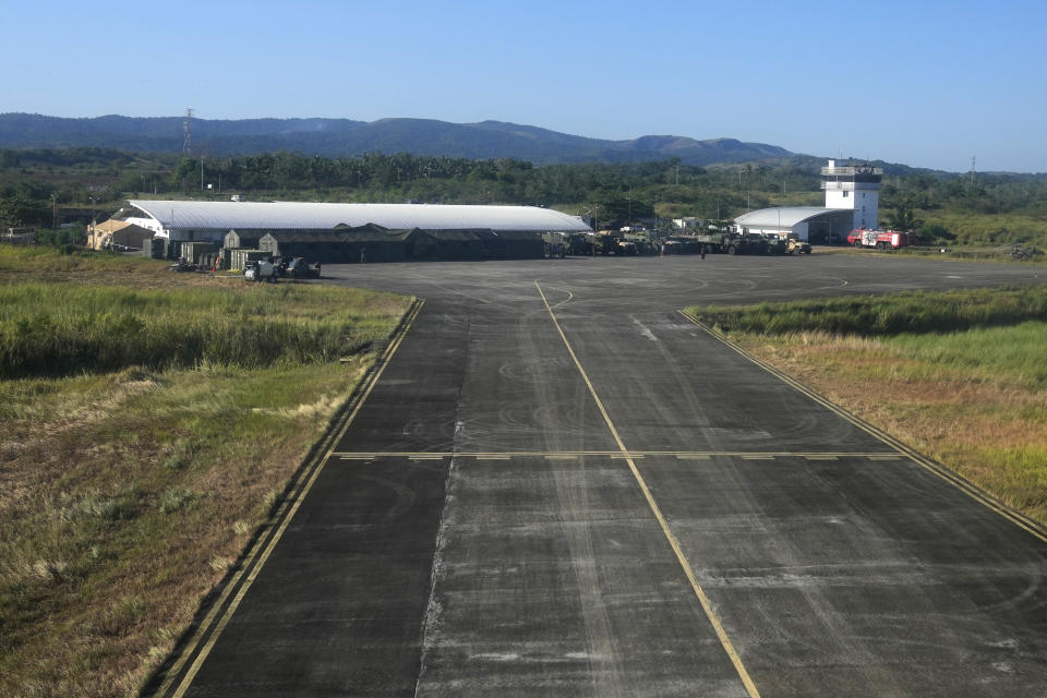 U.S. military vehicles are parked at Lal-lo airport in Lal-lo town, Cagayan province, northern Philippines Monday, May 6, 2024. The United States and the Philippines, which are longtime treaty allies, have identified the far-flung coastal town of Lal-lo in the northeastern tip of the Philippine mainland as one of nine mostly rural areas where rotating batches of American forces could encamp indefinitely and store their weapons and equipment within local military bases under the Enhanced Defense Cooperation Agreement, or EDCA. (AP Photo/Aaron Favila)