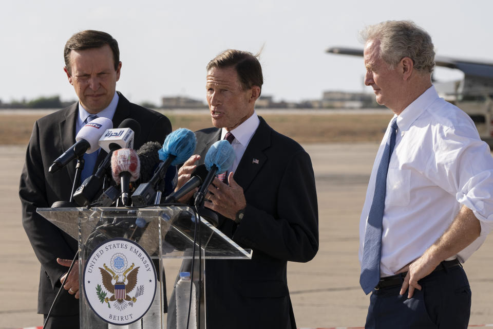 Sen. Chris Murphy, D-C.T., left, Sen. Chris Van Hollen, D-Md., right, and Sen. Richard Blumenthal, D-C.T., attend a press conference at the military airbase in Beirut airport, Lebanon, Wednesday, Sept. 1, 2021. A delegation of four U.S. senators visiting Lebanon promised to work on easing Lebanon's crippling economic crisis. (AP Photo/ Hassan Ammar)