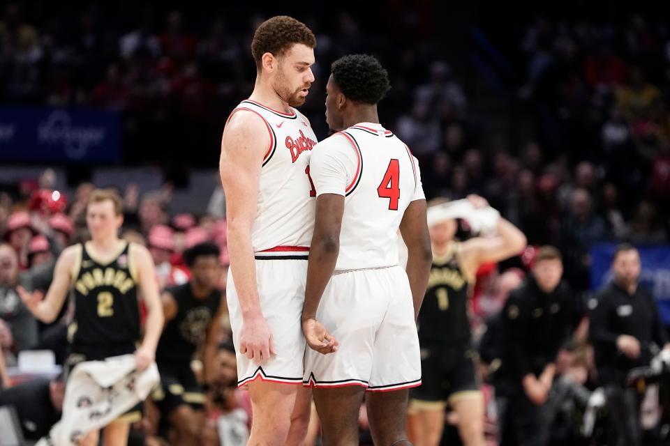 Feb 18, 2024; Columbus, Ohio, USA; Ohio State Buckeyes forward Jamison Battle (10) chest bumps guard Dale Bonner (4) during the second half of the NCAA men’s basketball game against the Purdue Boilermakers at Value City Arena. Ohio State won 73-69.