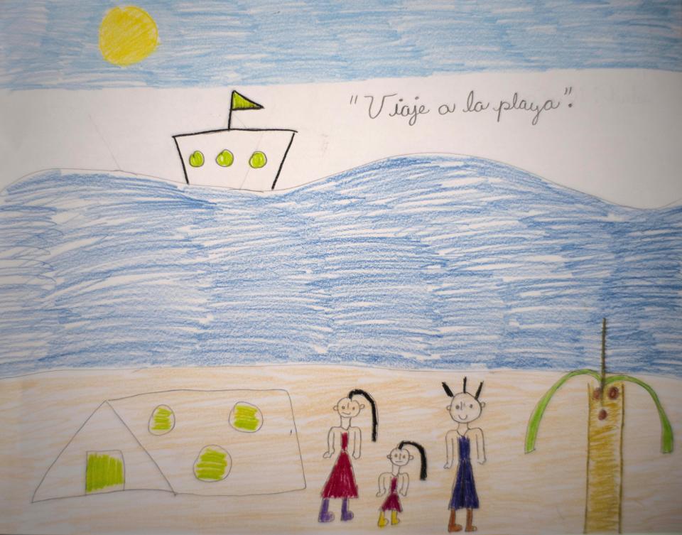 This Friday, May 8, 2020 photo shows a drawing by Ana Laura Ramirez Lavandero, 10, in which she expresses her wish to make a trip to the beach during the COVID-19 coronavirus lockdown in Havana, Cuba. The only time she’s been able to go out in nearly two months has been for an emergency trip to the dentist. Schools are closed, and because many people in Cuba don’t have internet, the education ministry is broadcasting lessons on state television. (AP Photo/Ramon Espinosa)