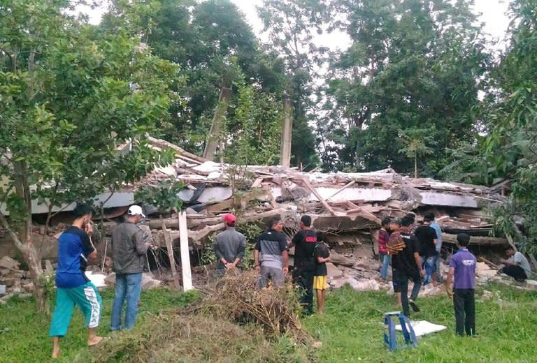 Dozens are feared trapped after a 6.5-magnitude earthquake struck Indonesia's Aceh province in northern Sumatra, on December 7, 2016.