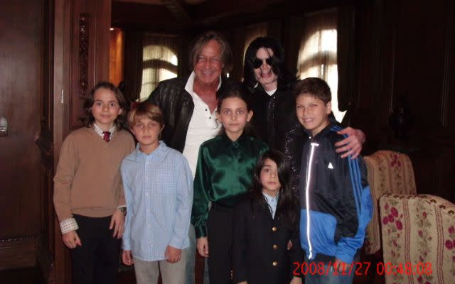 WESTWOOD, CA – NOVEMBER 27: In this handout photo provided by Mohamed Hadid, singer Michael Jackson (3rd R) poses with real estate developer Mohamed Hadid (3rd L), Hadid’s children and Jackson’s children Michael Joseph Jr. (L), Paris Michael Katherine (C) and Prince Michael II (2nd R) on November 27, 2008 at the Jackson Holmby Hills residence in Westwood, California. Michael Jackson spent his final days in the house that Hadid had originally built and that Jackson leased for $100,000 a month from the current owner. Hadid, who calls himself a close friend of Michael Jackson, spent some of Jackson’s last days with him and is now speaking out about Jackson’s health and state of mind during the last few weeks before his death. (Photo by Mohamed Hadid via Getty Images)