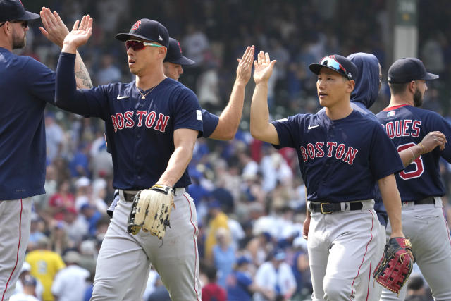 Yoshida hits a grand slam and drives in 6 as the Red Sox rout the Cubs 11-5  behind Crawford