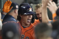 Houston Astros' Jake Meyers celebrates in the dugout after hitting a home run against the Los Angeles Angels during the second inning of a baseball game Friday, July 1, 2022, in Houston. (AP Photo/David J. Phillip)
