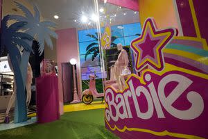 Barbie Mania Completely Takes Over Houston's Tallest High-Rise — Embracing  The Box, Pink Swimsuits and So Much More - PaperCity Magazine