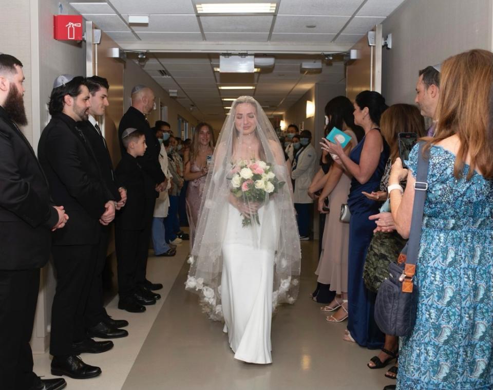 Rather than hosting hundreds of guests at an ornate banquet hall, Linde celebrated her nuptials with 23 loved ones and hospital staffers in early June. Michael Krasowitz