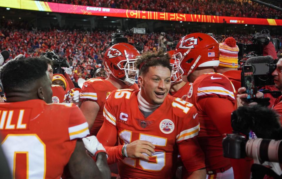 Chiefs quarterback Patrick Mahomes celebrates the win against the Buffalo Bills in overtime Sunday night in Kansas City.