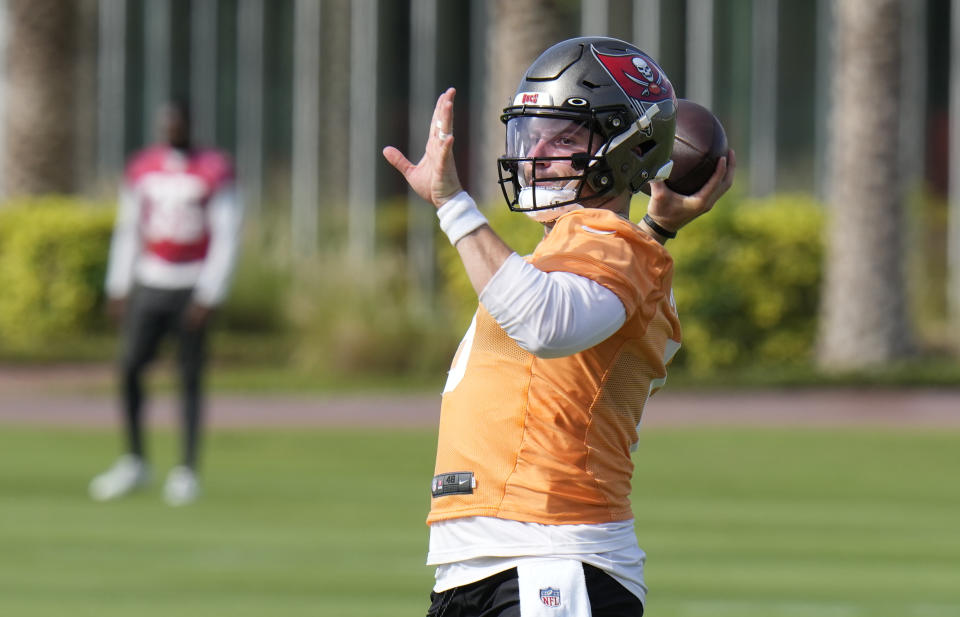 FILE - Tampa Bay Buccaneers quarterback Baker Mayfield throws during an NFL football practice Thursday, June 15, 2023, in Tampa, Fla. The competition between Baker Mayfield and Kyle Trask to replace Tom Brady is extending into training camp. (AP Photo/Chris O'Meara, File)