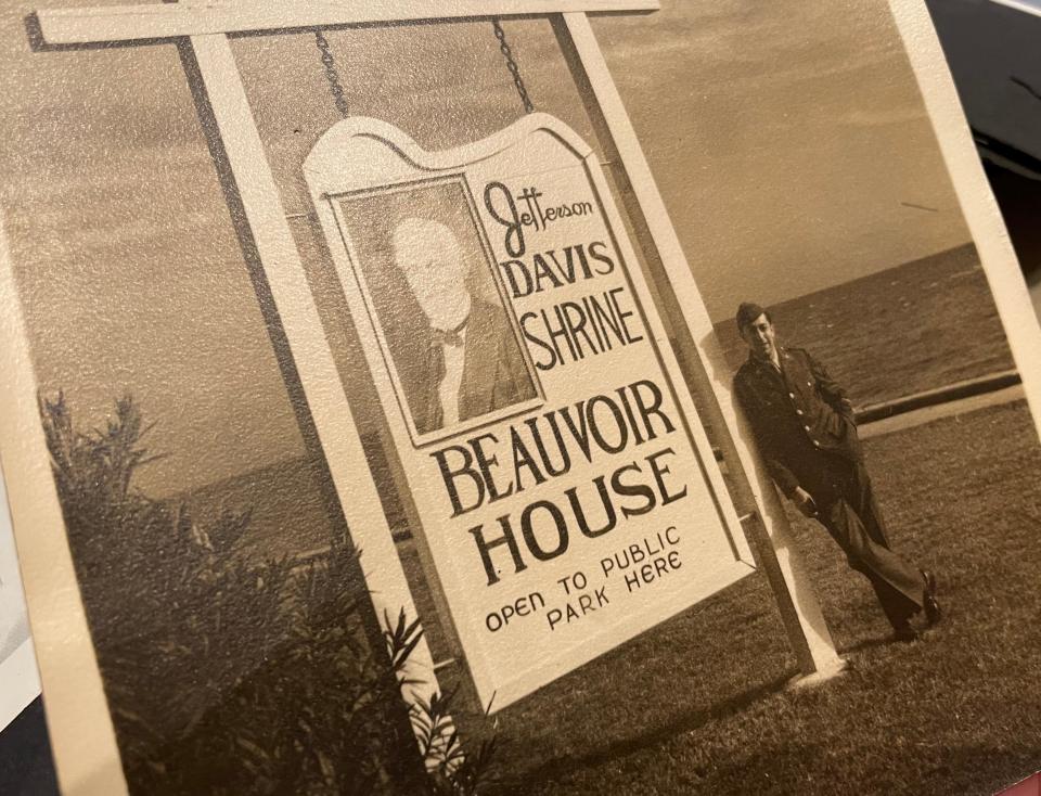 A young E. Milton Silvia stands before the sign at the Jefferson Davis Shrine in Biloxi, Mississippi.