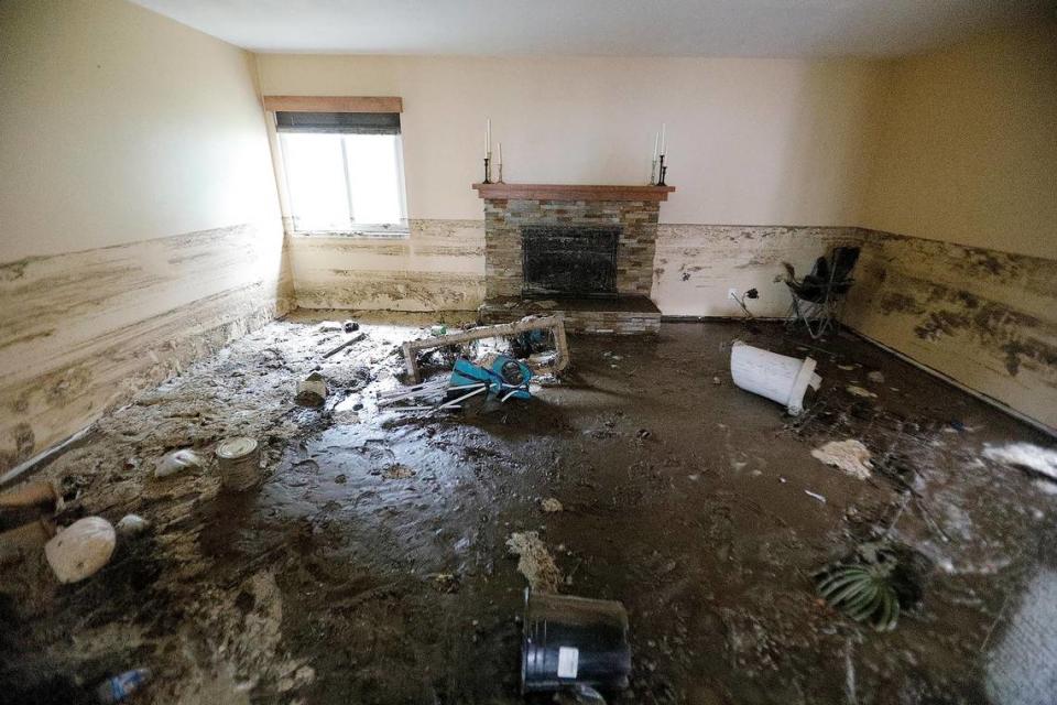 Lines on the wall show how high water filled this home on Vista Court in Los Osos, on Jan. 10, 2023. The neighborhood was hit by a torrent of water and mud Monday afternoon, causing devastating damage.