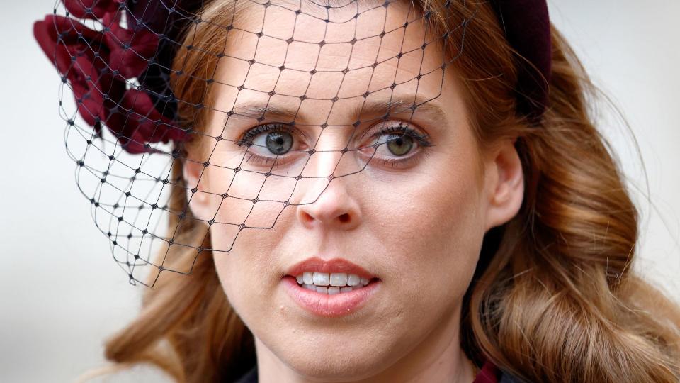 Princess Beatrice in netted burgundy headband