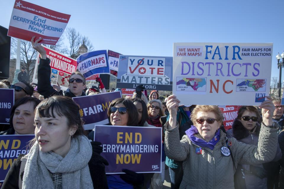 Protesters attends a rally for "Fair Maps" on March 26, 2019, in Washington, DC. The rally was part of the Supreme Court hearings in landmark redistricting cases out of North Carolina and Maryland.