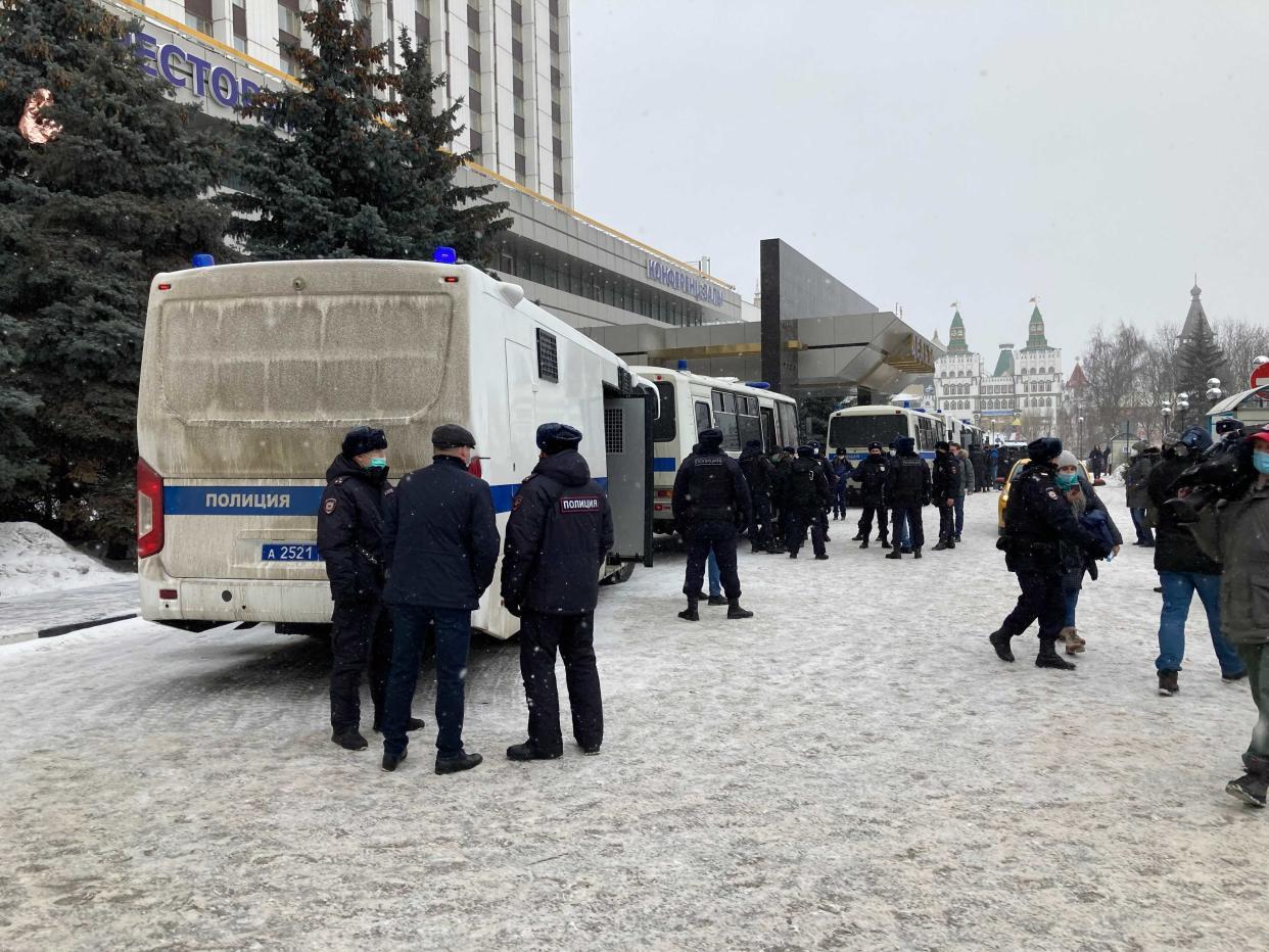 Russian security forces are seen outside a venue in Moscow where an opposition gathering was broken up in a police raid and almost 200 politicians and activists were arrested, March 13, 2021.   / Credit: Hannah Wagner/dpa/Getty