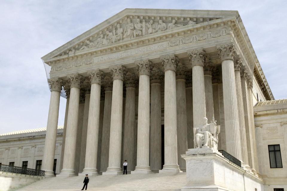 FILE - In this March 28, 2012 file photo, the Supreme Court is seen in Washington. Suddenly at the heart of presidential politics, the Supreme Court is preparing what could be blockbuster rulings on health care and immigration just before the election. President Barack Obama already seems to be running against the justices at times in a year that's brought unprecedented campaign spending after the high court rewrote the nation's election finance laws. (AP Photo/Charles Dharapak, File)