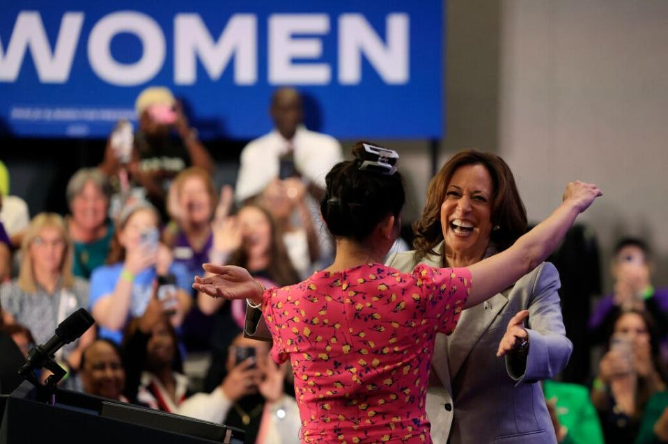 Vice President Kamala Harris is greeted warmly by Dr. Shelly Tien before speaking May 1 at the Prime Osborn Convention Center in Jacksonville. She denounced Florida's six-week abortion ban, which took effect the same day. Tien is a gynecologist and abortion provider.