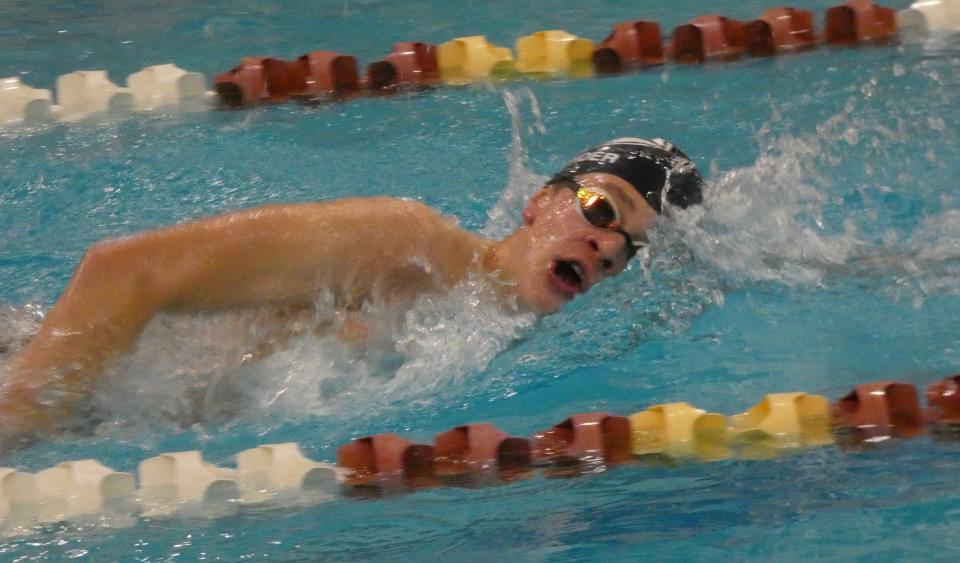 Granville freshman Nolan Schneider swims the 500 freestyle during a quad against Watkins Memorial, Northridge and Johnstown swam at New Albany on Saturday, Jan. 28, 2023.