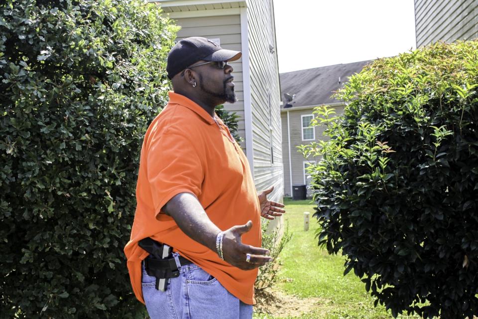 Luther Thompson, 41, poses with his firearm outside his Cartersville, Ga. home.<span class="copyright">Photo courtesy Luther Thompson</span>