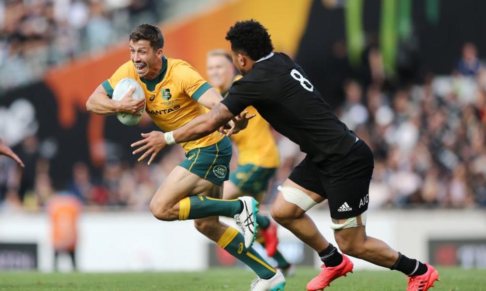 Jake Gordon of the Wallabies makes a run against Ardie Savea of the All Blacks during the Bledisloe Cup match between the All Blacks and the Wallabies at Eden Park.