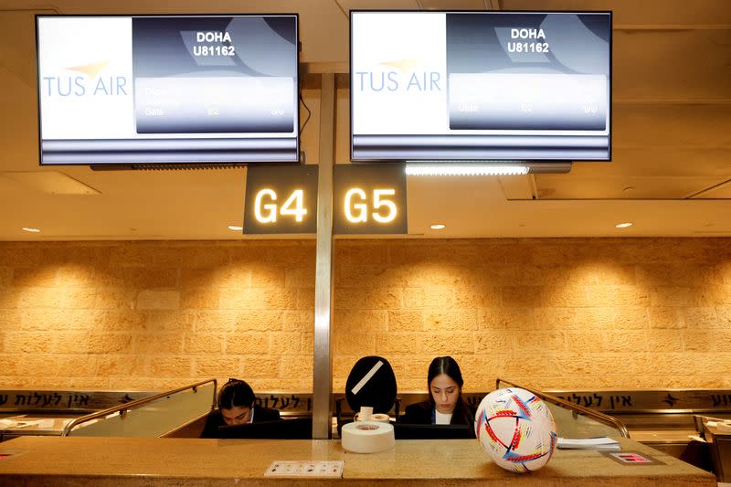 A football is seen on the check-in desk before the first direct commercial flight between Israel and Qatar for the 2022 FIFA World Cup Qatar, at Ben Gurion International Airport, near Tel Aviv