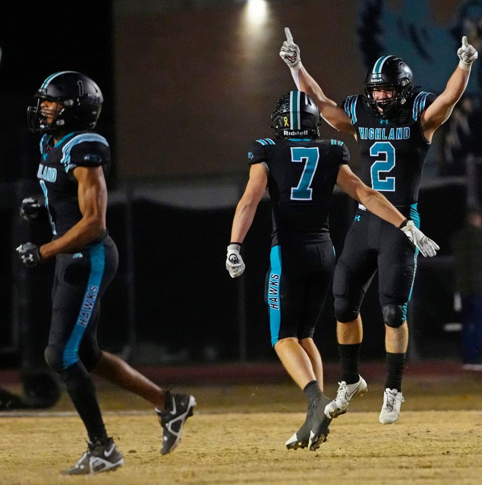 December 2, 2022; Gilbert, Ariz; USA; Highland safeties Joseph Allen (2) and Cole Crandall (7) celebrate Allen’s game clinching interception returned for a touchdown against Red Mountain during the 6A Semfinal at Highland High School.