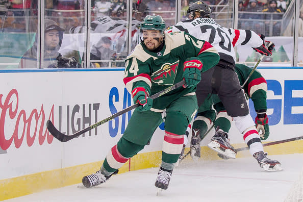 Minneapolis, MN - FEBRUARY 21: Matt Dumba #24 of the Minnesota Wild passes the puck against the Chicago Blackhawks during the 2016 Coors Light NHL Stadium Series on February 21, 2016 at TCF Bank Stadium in Minneapolis, Minnesota. (Photo by Bruce Kluckhohn/NHLI via Getty Images)