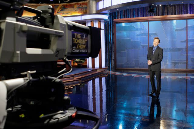 <p>Paul Drinkwater/NBCU Photo Bank/NBCUniversal via Getty </p> Conan O'Brien hosting The Tonight Show in 2010.